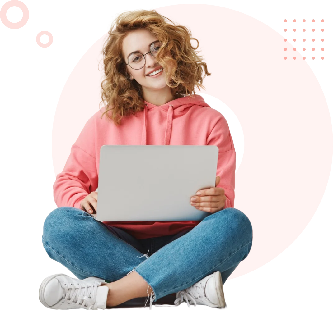 Girl sitting with a laptop on her lap